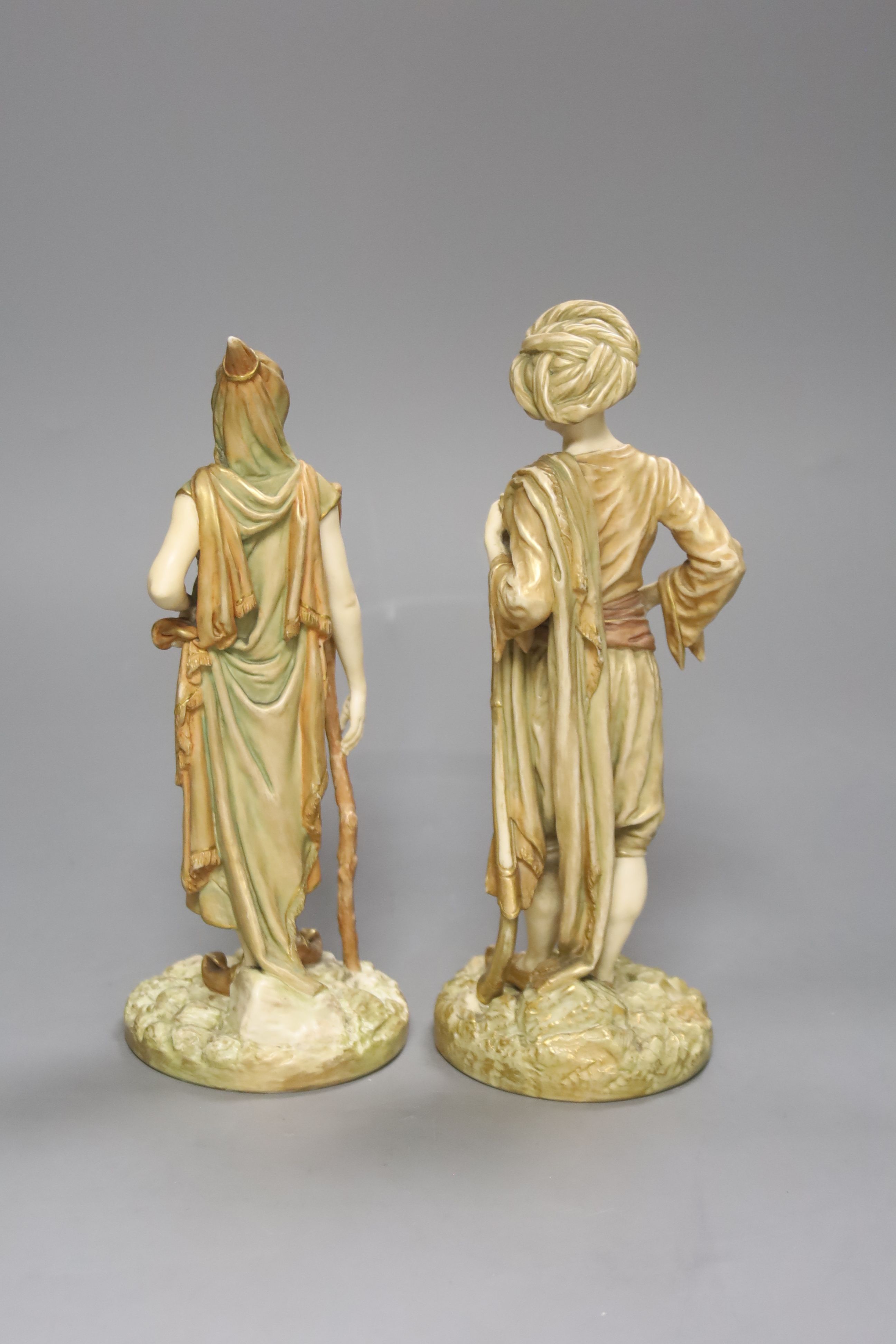 A pair of Royal Worcester blush figures of Bringaree Indians, 1893, height 23cm